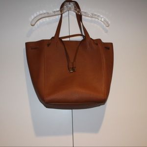 drawstring brown leather bag
